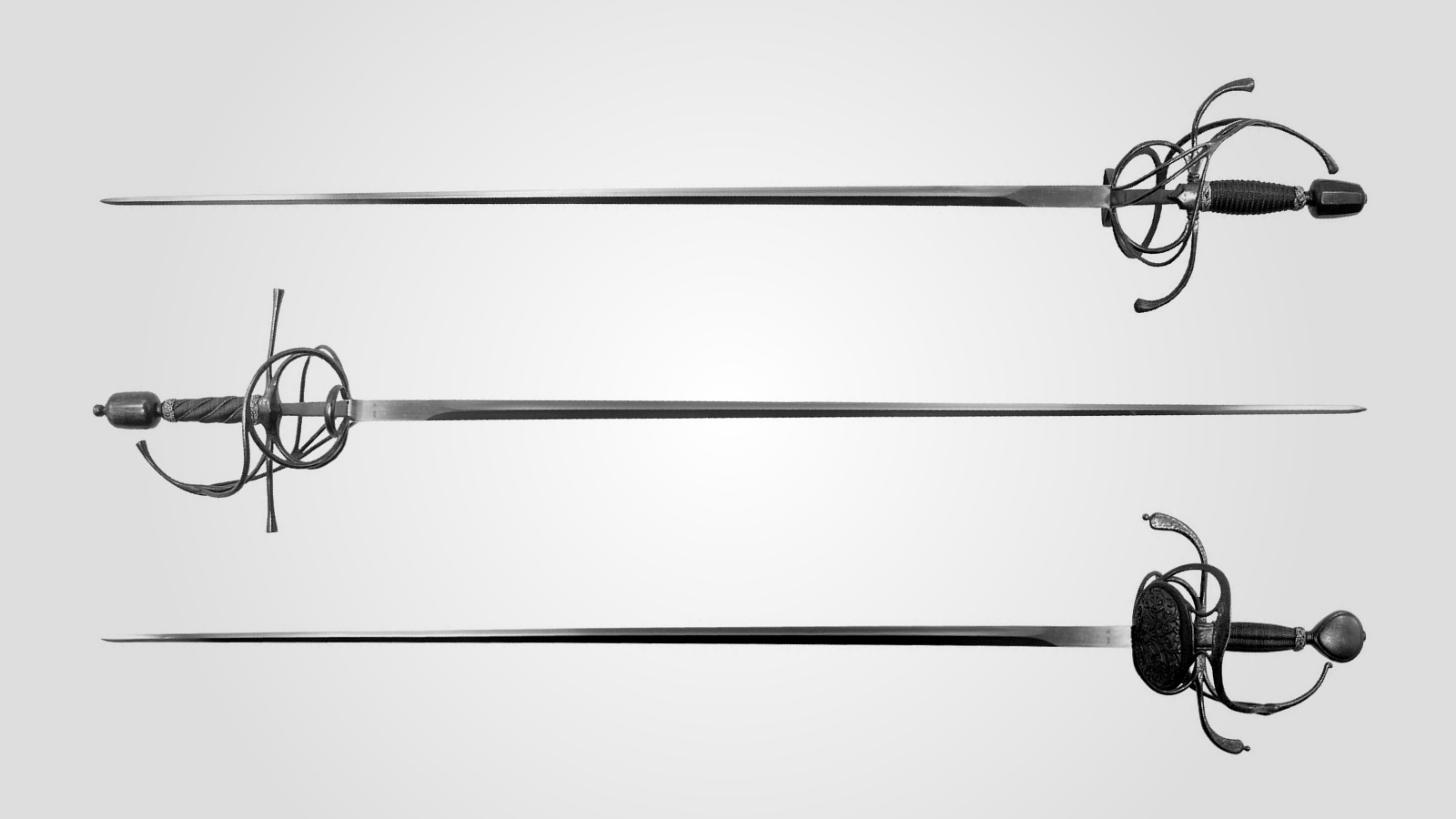 Three swords, as if from Dumas' The Three Musketeers