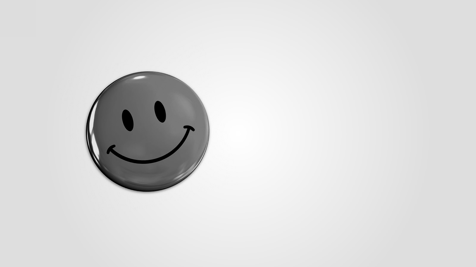 A button pin of a smiley-face