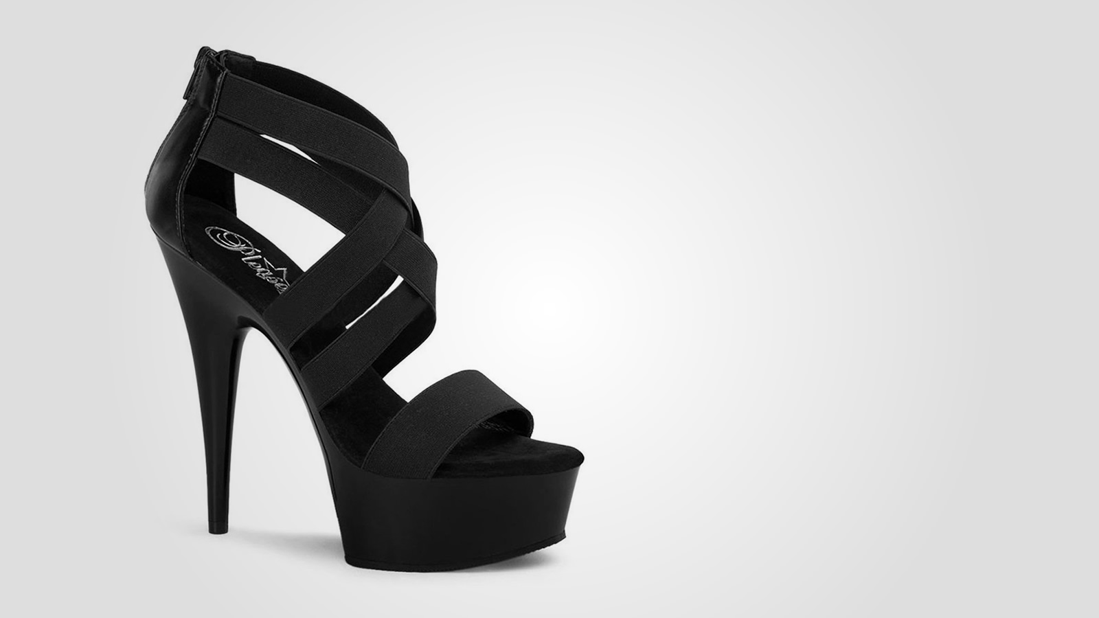 A strappy high-heeled shoe