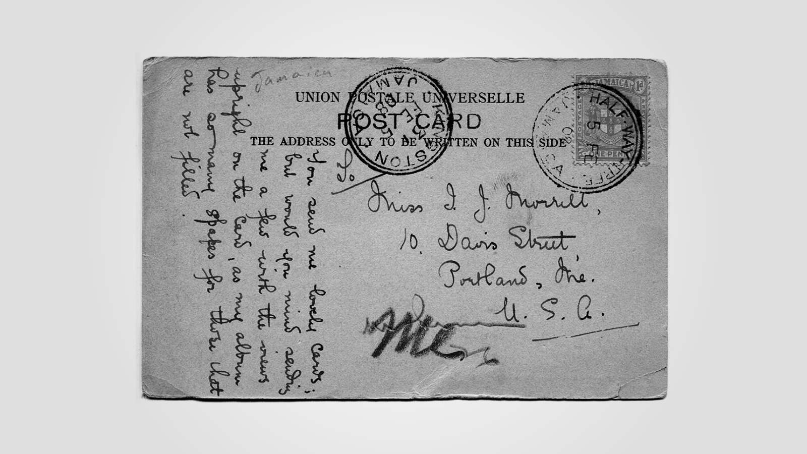 The inscribed, postmarked reverse of an old postcard