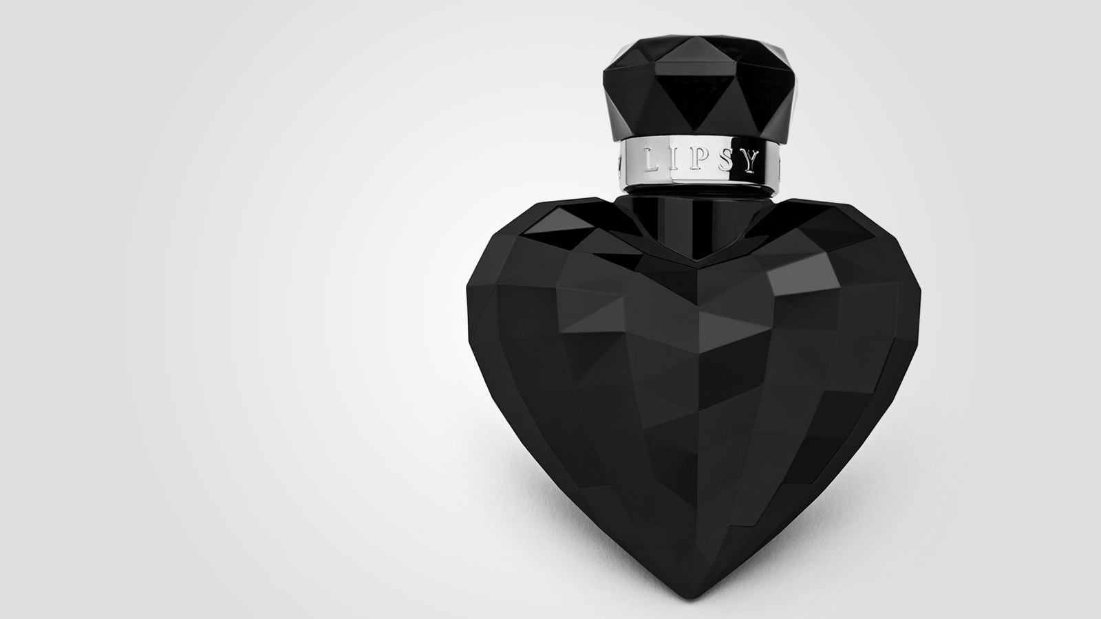 A heart-shaped perfume flacon