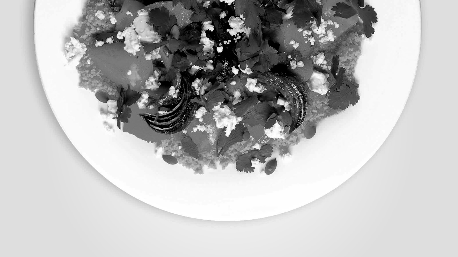A close-up of a plate with a serving of food
